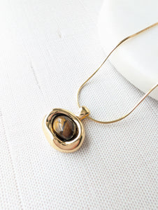Golden Eye Pendant Necklace