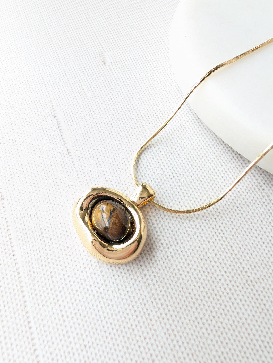 Golden Eye Pendant Necklace